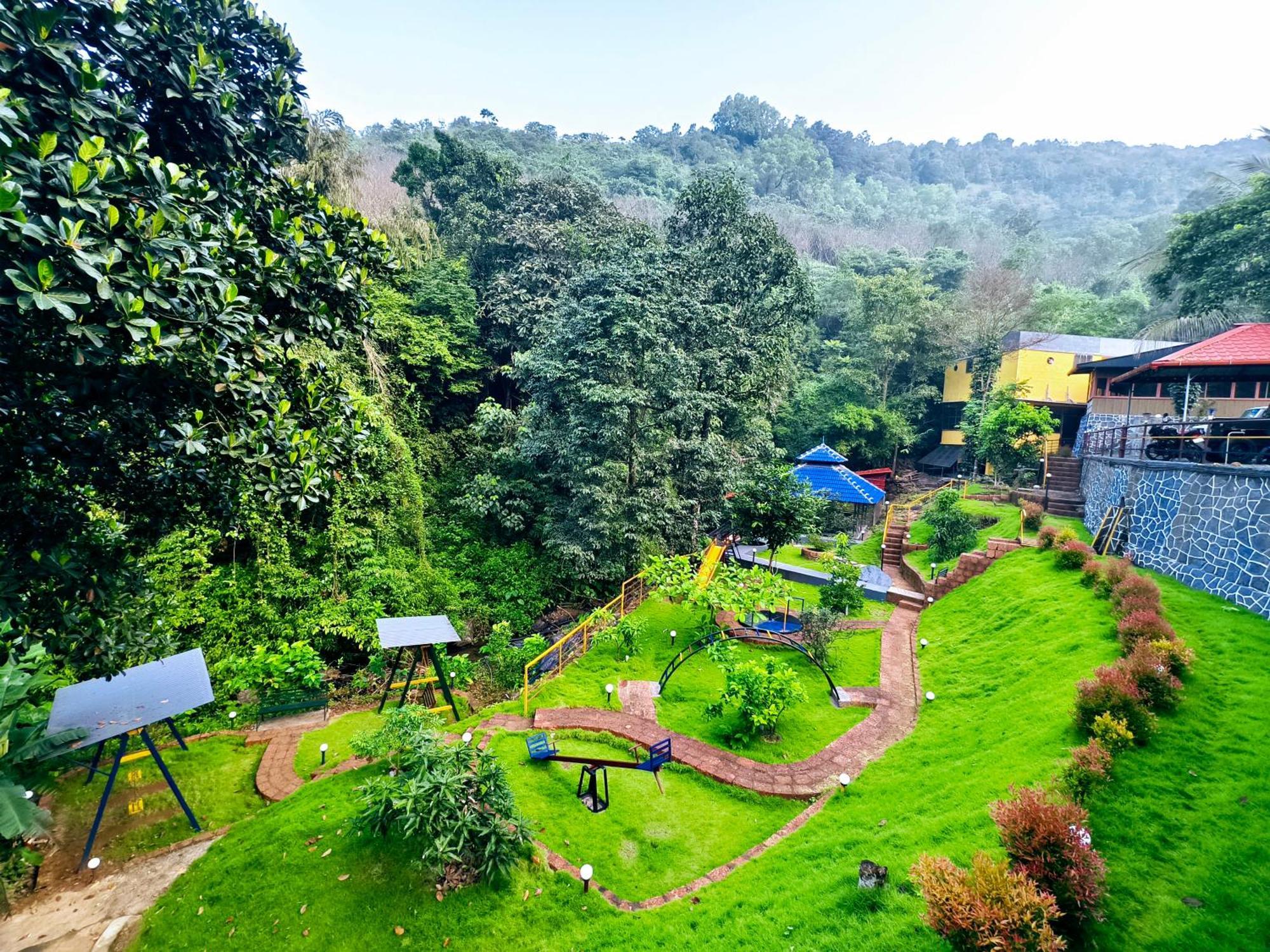 Forest And River Edge Resort Канур Екстериор снимка